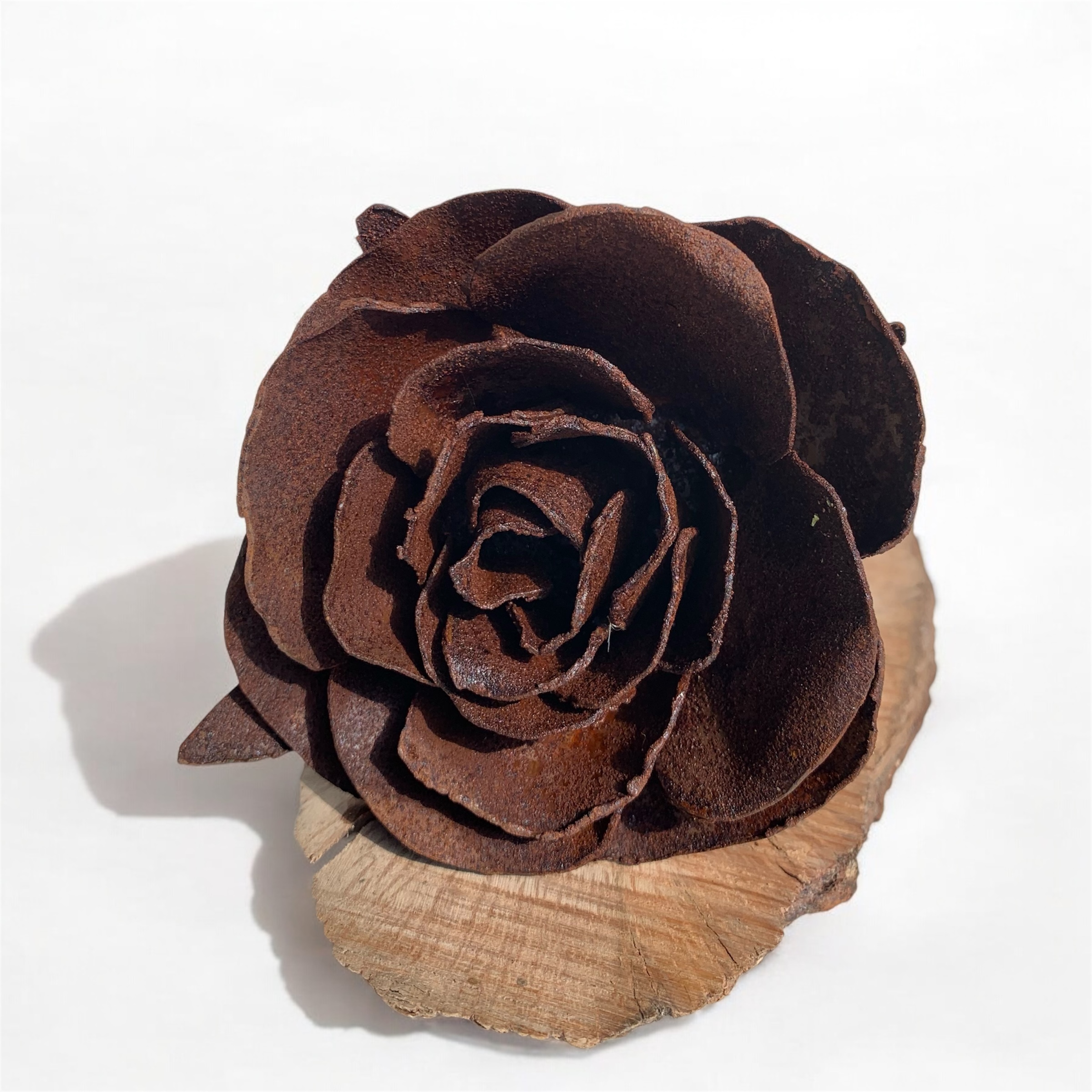 rosa de forja con base de madera